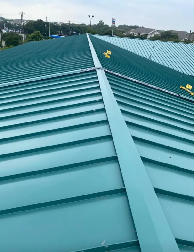 Green commercial metal roof ridge and valley for Metal Roof Repair in West Melbourne